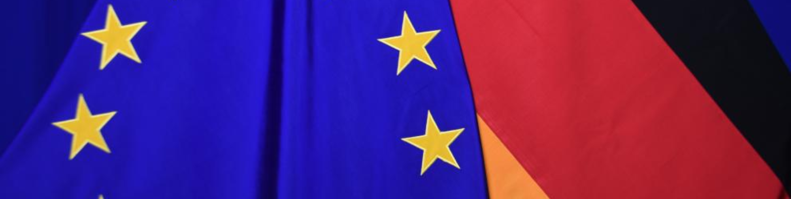 EU-Flagge und Deutschland-Flagge nebeneinander