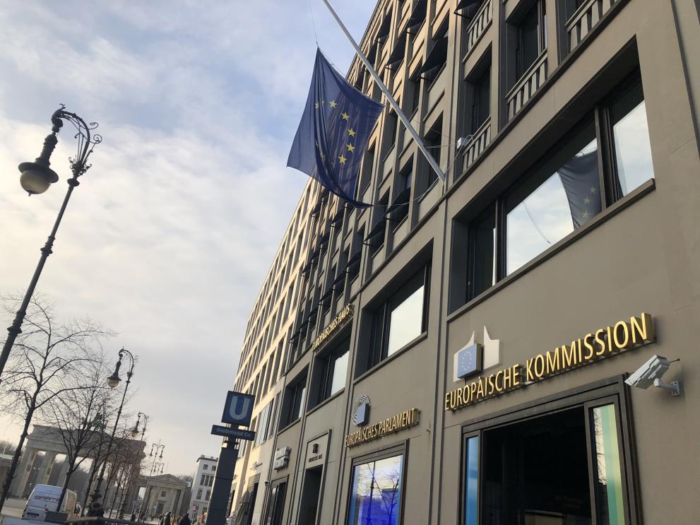 A picture from the outside of the Representation of the Euorpean Commission in Berlin. You can see the EU flag at half mast. 