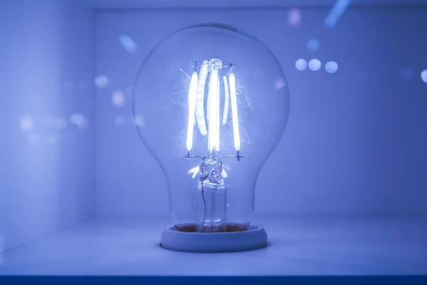 A lit lightbulb.